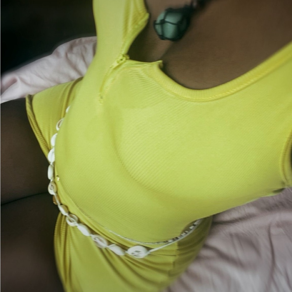 Chic Yellow Sleeveless Dress with Shell Accent